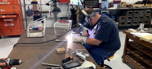 Alex welding on the first ADV1 prototype.