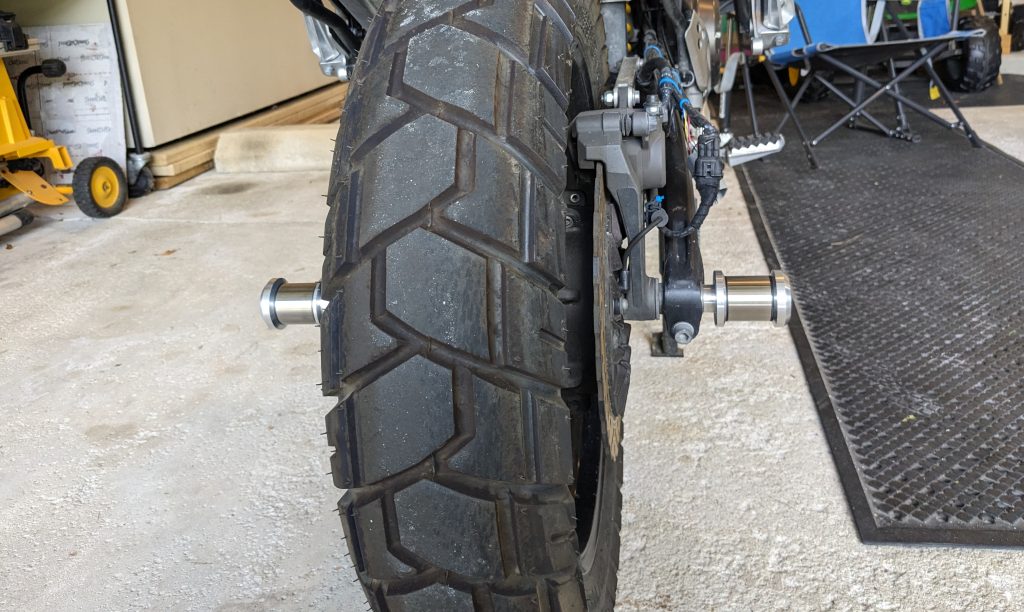 Looking at the ADV1's axle adapter on a Yamaha Super Tenere