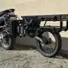 adv1 trailer unloaded on white brick background
