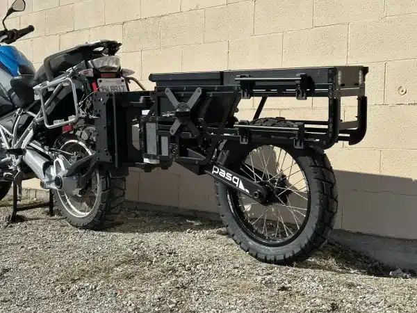 adv1 trailer unloaded on white brick background