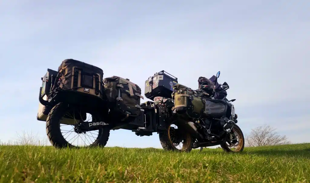 pasq loaded with mosko and hitched to a bmw gs on the prairie